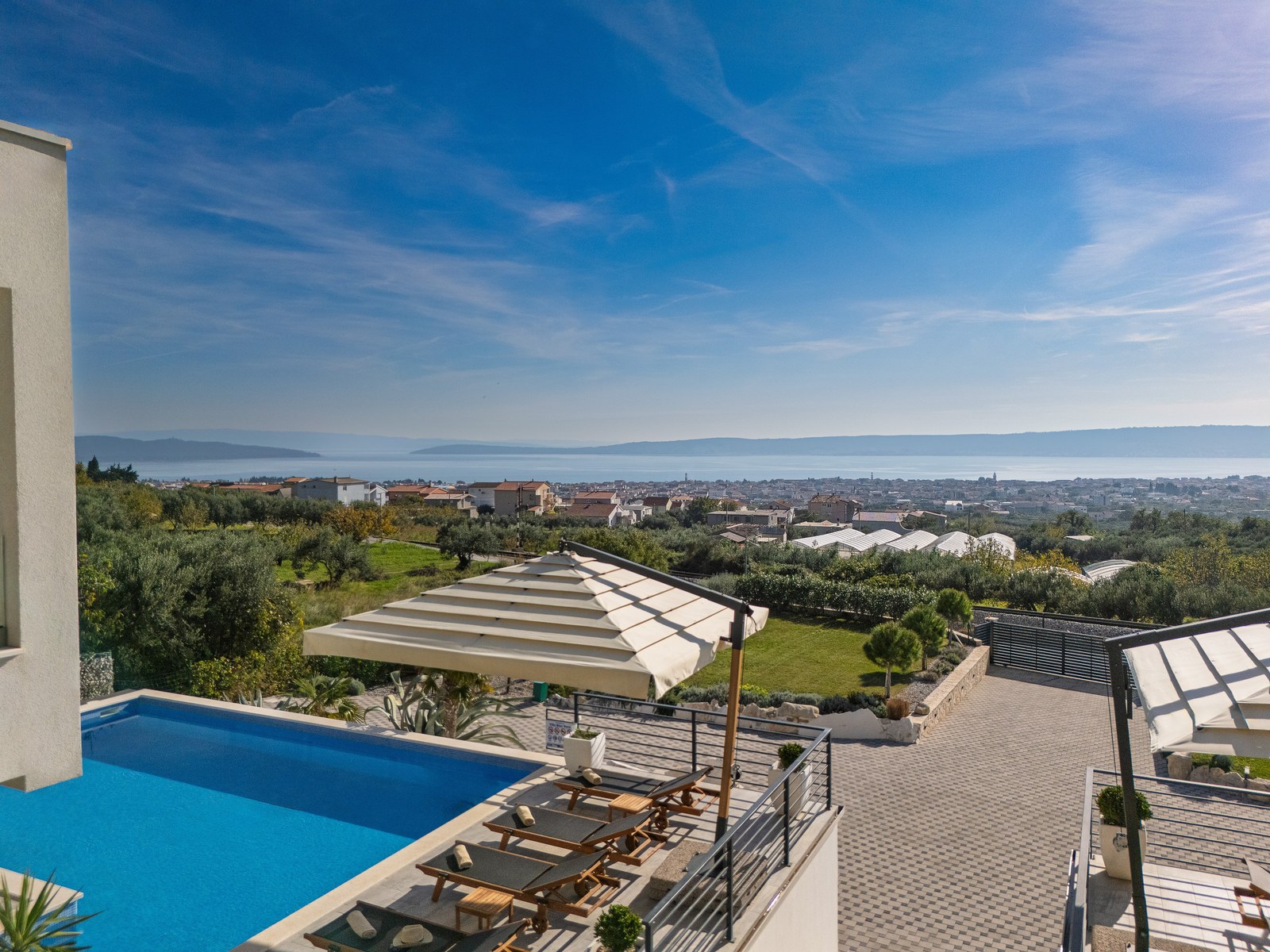 View from Villa BlueWave across the pool and Kaštela towards the Adriatic Sea